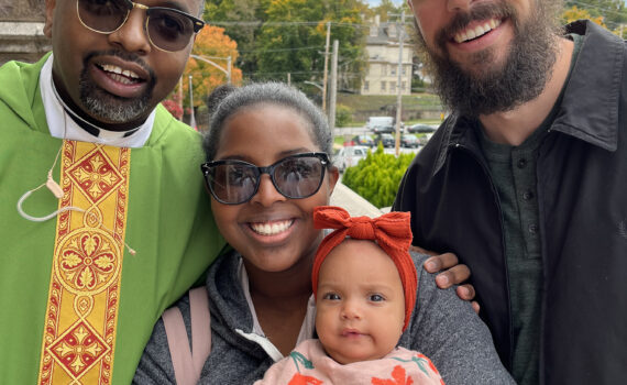 First Sunday service for Noah Marie. L to R: Father Sam, Asia, Noah Marie, Robert.